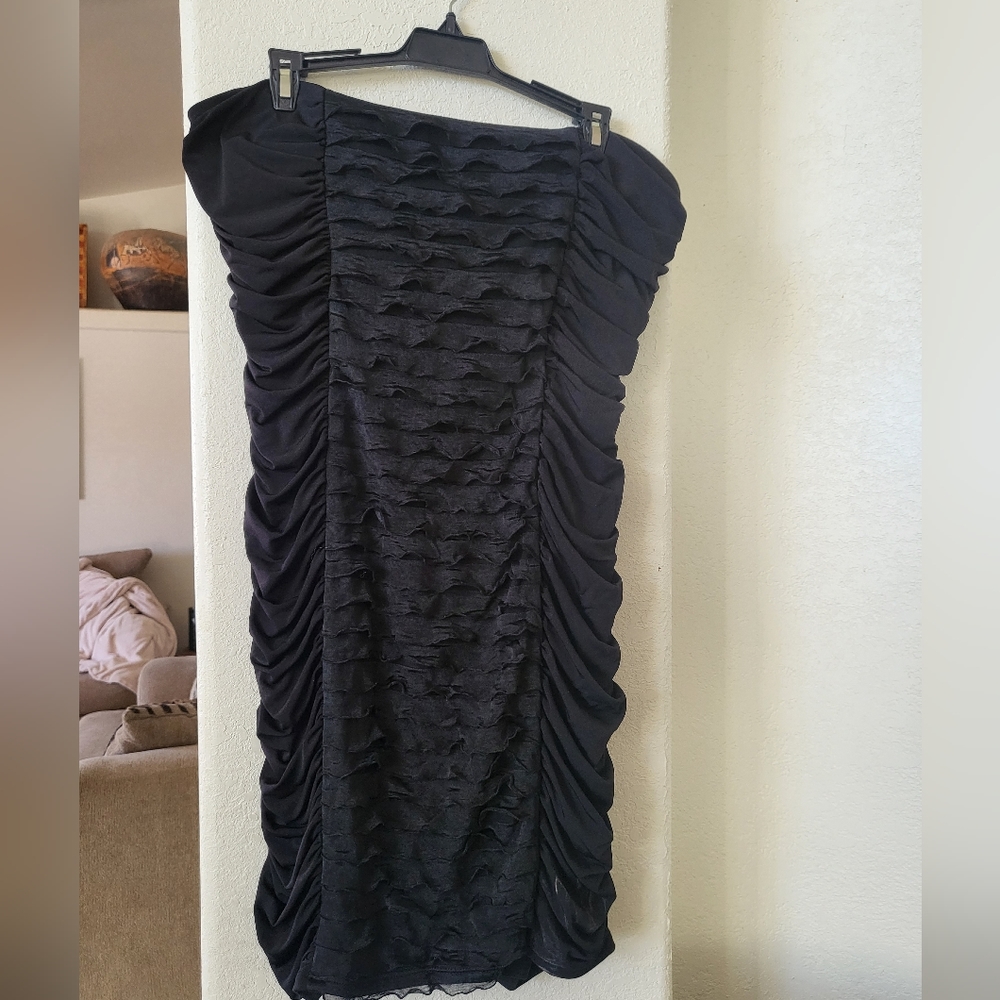 Strapless ruched black dress.